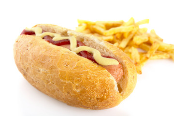 Hot dog with french fries isolated on white