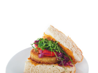 vegan bread with breaded spiced tofu, mashed eggplant and carrot spread and vegetables