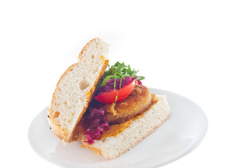 vegan bread with breaded spiced tofu, mashed eggplant and carrot spread and vegetables