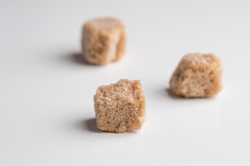 Pure Sugar Cane Cubes on a white background