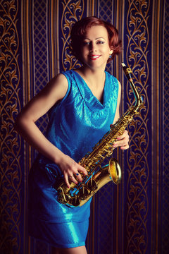 actress with saxophone