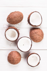Coconut on wooden table.