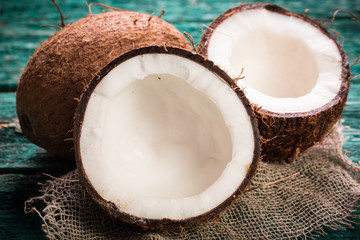 Coconut on wooden table.