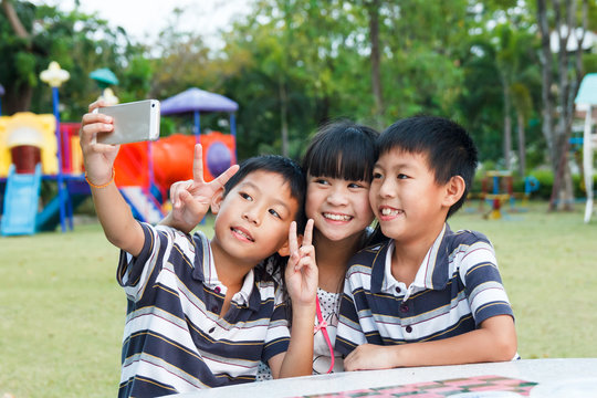 Thai twin brother and sister selfie.