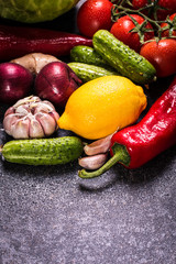 Assortment of fresh vegetables close up on black table