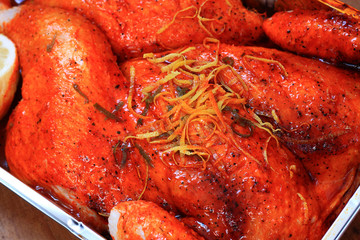 Chicken with a Piri Piri marinade in a baking tray