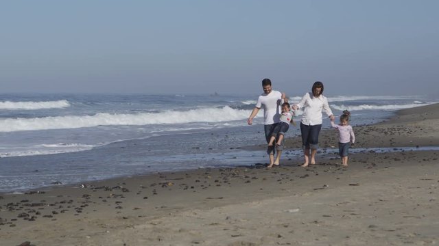 Family on the beach - 4K