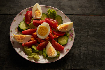 vegetable salad with boiled eggs in a restaurant