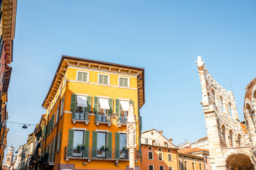 Beautiful buildings on Bra square near Arena in Verona city in Italy