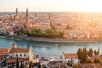 Fototapeta premium Panoramic aerial view on Verona old town from the castle hill on the sunset