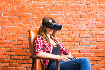 Woman play the video game with virtual reality device