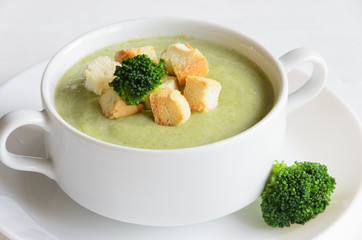 Fresh broccoli cream soup served with croutons