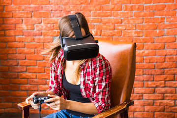 Fototapeta na wymiar Woman play the video game with virtual reality device