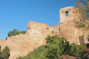 Fototapeta na wymiar Fragment of wall of ancient fortress of Alcazaba Malaga, Spain