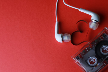 cassette with tape shape heart on red