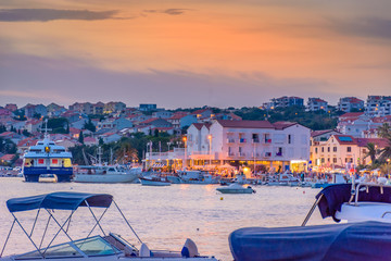 Novalja town sunset time. / Novalja is touristic place on Island of Pag, famous place for party and nightlife. 