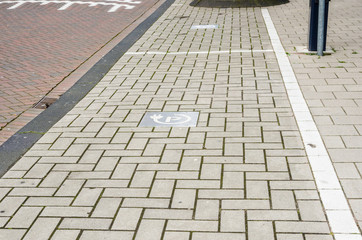 Fototapeta premium Empty Parking Space for Electric Cars