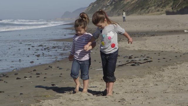 Young girls on the beach - 4K