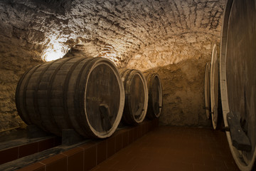 Antique Wine Cellar with Rusty Wooden Barrels