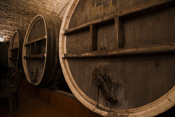 Antique Wine Cellar with Rusty Wooden Barrels