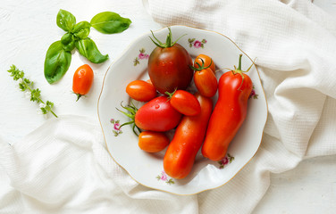 Snack tart from homemade filo dough with mozzarella, basil, tomatoes and garlic