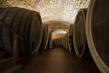 Antique Wine Cellar with Rusty Wooden Barrels