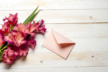 Colorful flowers in envelope, flower delivery concept. congratulate.