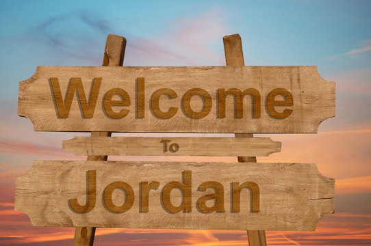 Welcome to Jordan sign on wood background