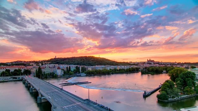 The View on Prague Hill Petrin timelapse with Owl's Mills after Sunset with beautiful colorful sky, Czech Republic