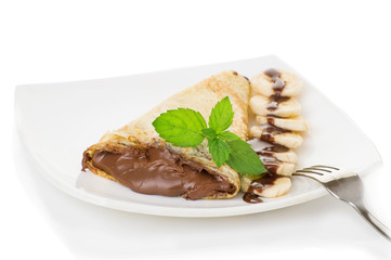 Crepes with chocolate cream and banana
