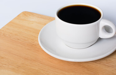 White Cup of Coffee on Wooden