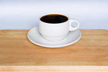 White Cup of Coffee on Wooden
