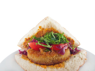 vegan flatbread with breaded spiced tofu, mashed eggplant and carrot spread and vegetables