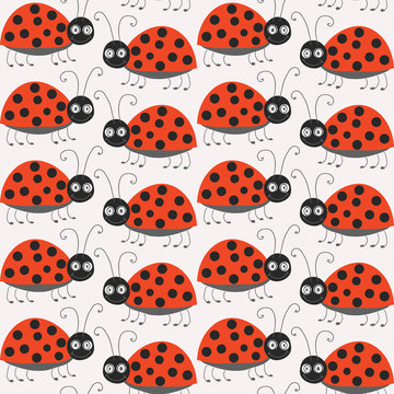 Seamless pattern with cute ladybirds