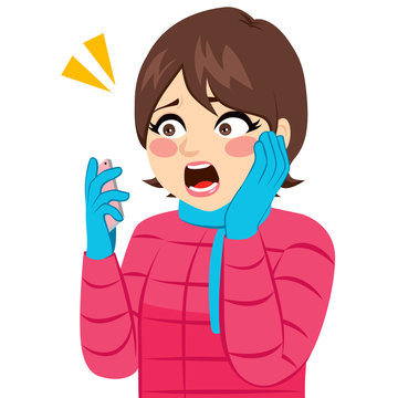 Young woman on winter clothes surprised receiving bad news with smartphone