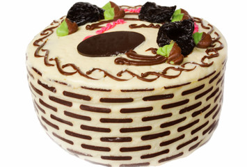 Delicious biscuit cake with prunes isolated on white background
