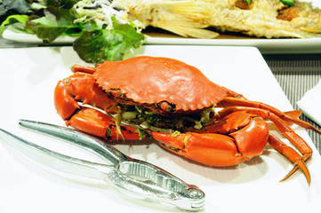 Sea crab and snapper seafood set with spicy sauce