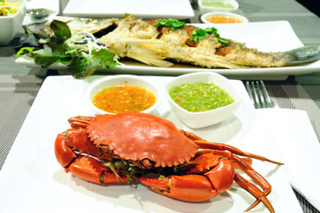 Sea crab and snapper seafood set with spicy sauce