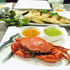 Sea crab and snapper seafood set with spicy sauce