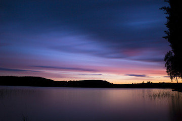 Fototapeta na wymiar Sunset by the water
