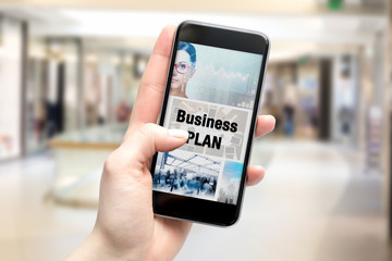 Fototapeta na wymiar business plan on the smartphone screen.