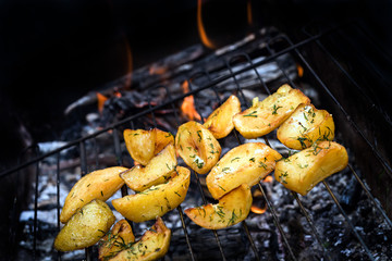 fried potatoes on the grill