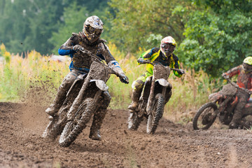 Motocross riders in the race