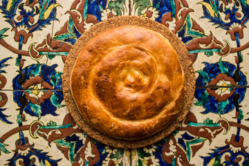 Turkish Bread Kete on a Ottoman Pattern surface.