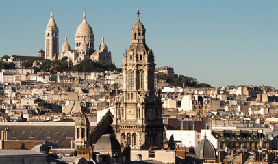 The Saint Trinity church and Sacre Coeur basilica, Paris, France