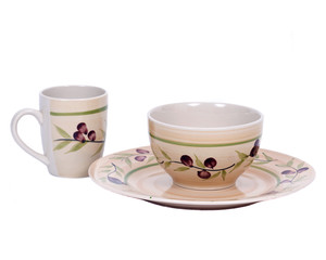 Painted cup, bowl and plate separated on white background