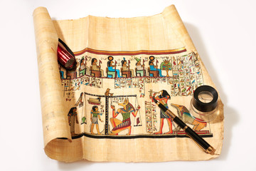 flashlight and Egyptian papyrus