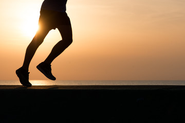 silhouette of a runner at sunset