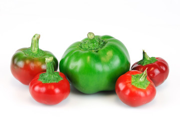 red and green bell peppers isolated on white background