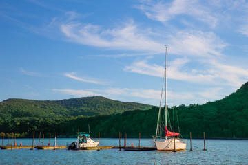 View of Hudson Valley in New York State with boats on the Hudson River and mountains in the background